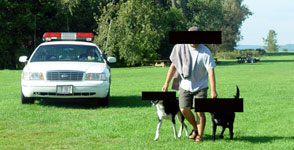 State Park Police rounding up off-leash doggers.